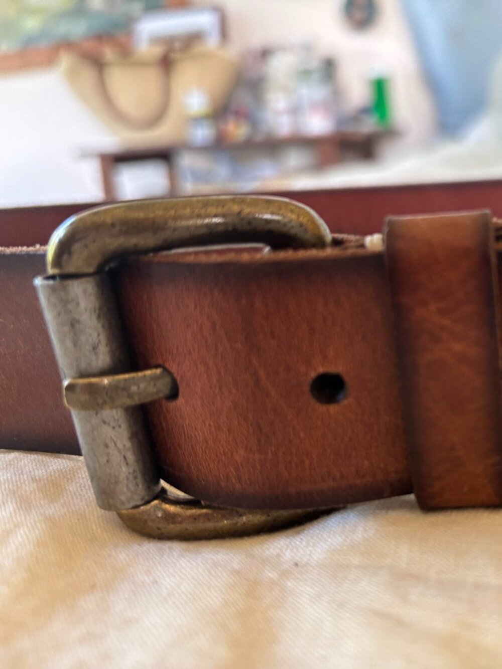 VINTAGE 1977 BROWN LEATHER BELT WITH GOLD AND SILVER BUCKLE